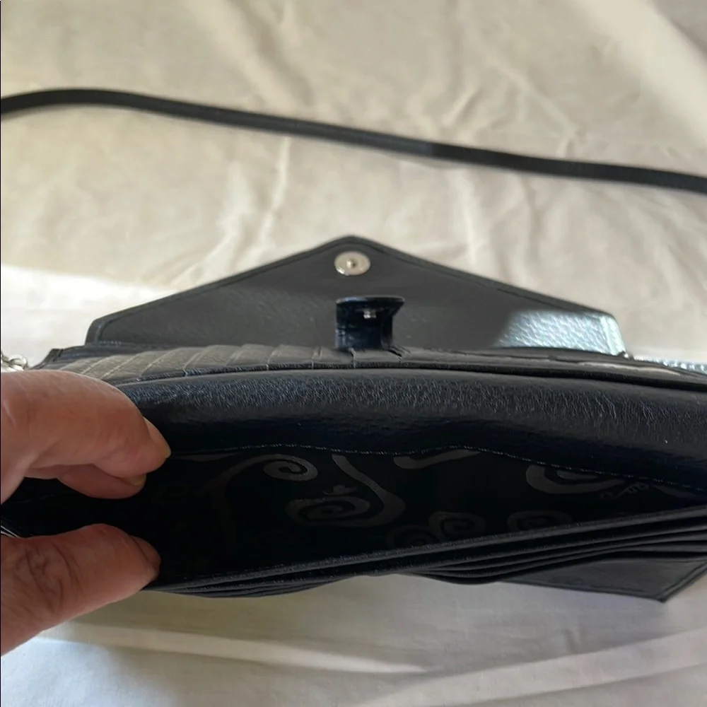 Brighton Black Crossbody Bag with Sleek Leather and Metallic Accents - Picture 9 of 11